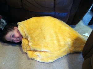 Declan cuddled up with his blanket